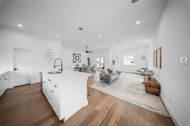 a view of a living room and bedroom