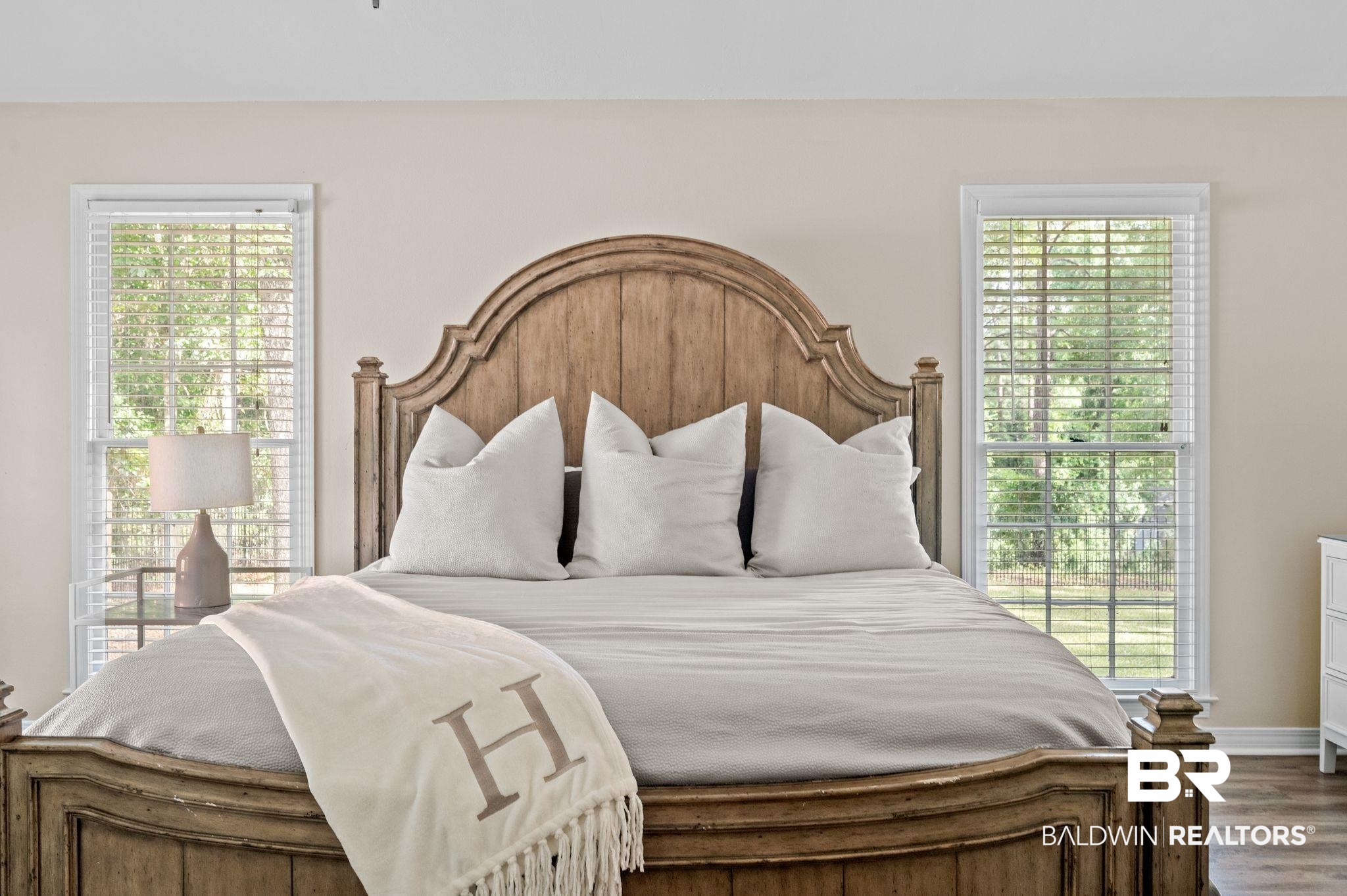 110 Ferncliff Circle Daphne, AL 36526 - Photo 23 of 40 Bedroom with wood finished floors, multiple windows, and baseboards