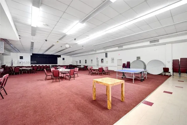 a living room with lots of furniture and a flat screen tv