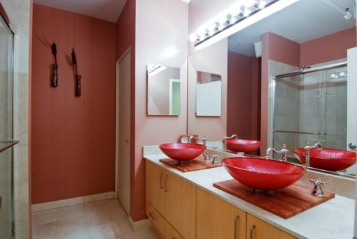 203 South Sangamon Street, Unit 310 Chicago, IL 60607 - Photo 11 of 16 a bathroom with a granite countertop sink a mirror and shower