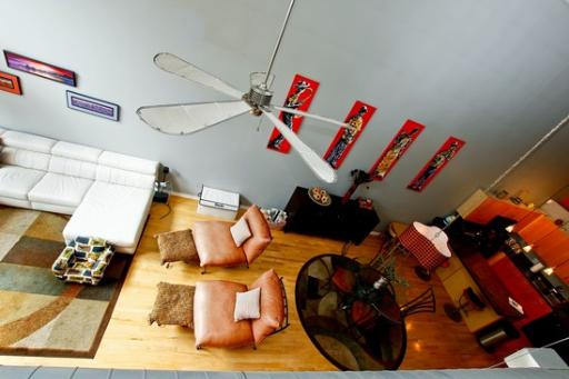 203 South Sangamon Street, Unit 310 Chicago, IL 60607 - Photo 6 of 16 a view of gym equipment and empty racks