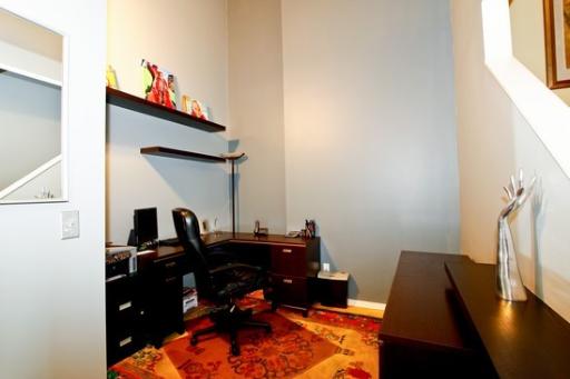 203 South Sangamon Street, Unit 310 Chicago, IL 60607 - Photo 9 of 16 a living room with furniture and a window