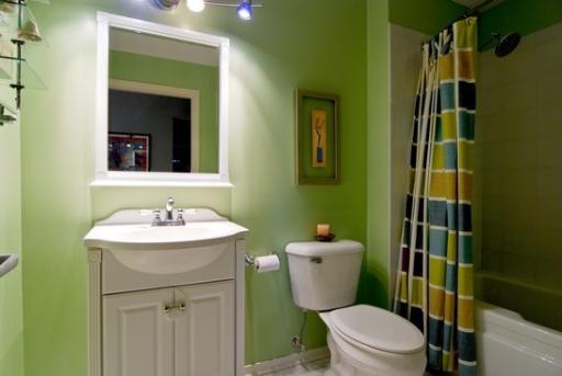 203 South Sangamon Street, Unit 310 Chicago, IL 60607 - Photo 10 of 16 a bathroom with a sink toilet and shower