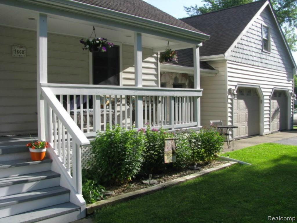 2660 31 Mile Road Washington, MI 48095 - Photo 4 of 50 porch and garage
