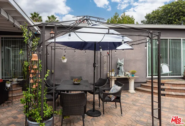 an outdoor space with furniture