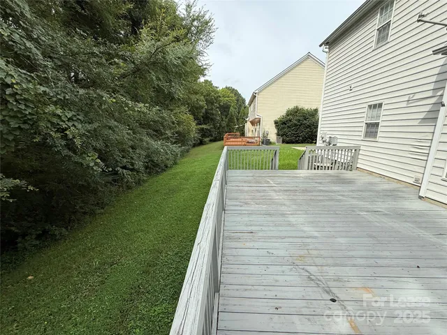 a view of a backyard with plants