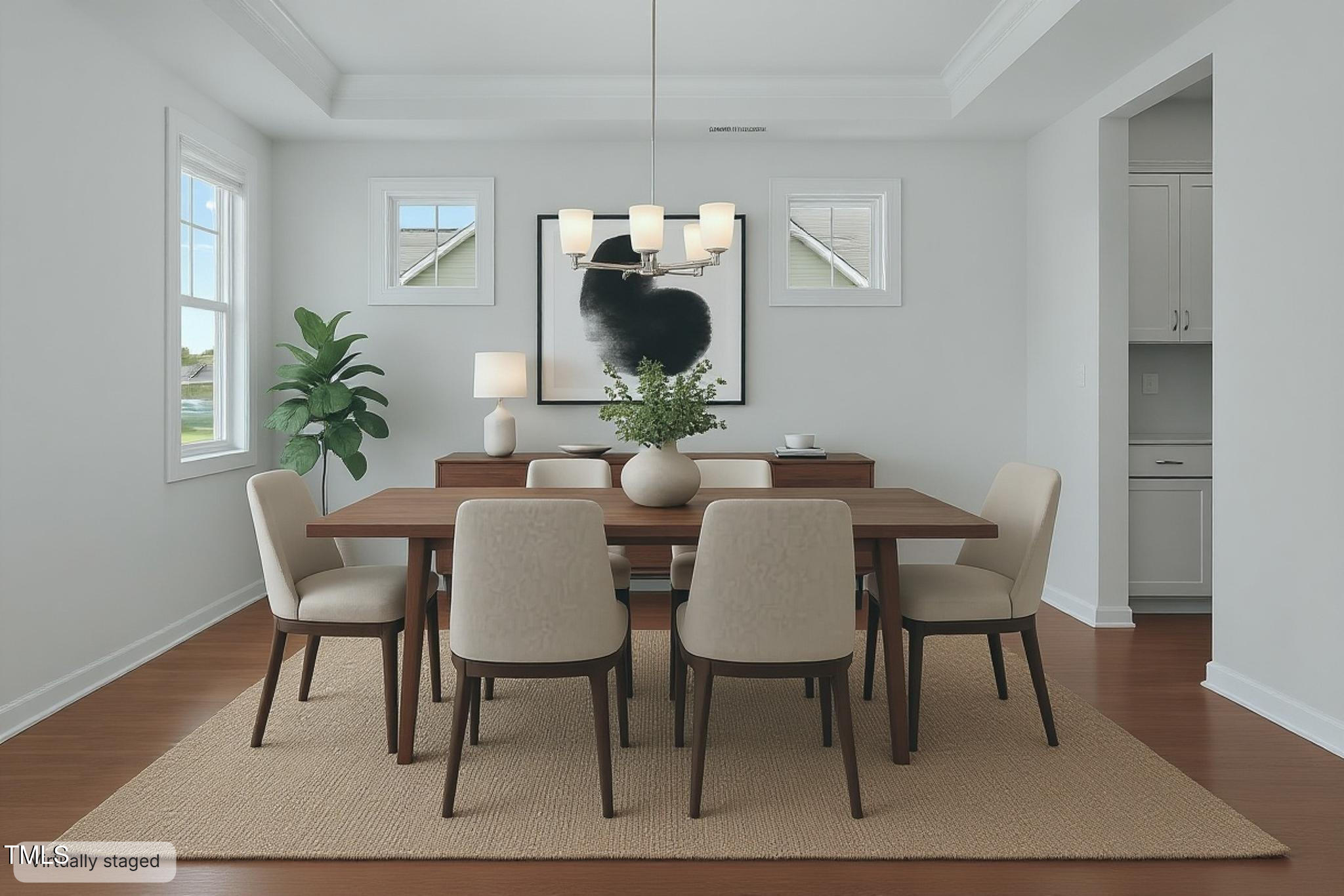 131 Sandy Springs Road Aberdeen, NC 28315 - Photo 9 of 61 a dining room with furniture and wooden floor