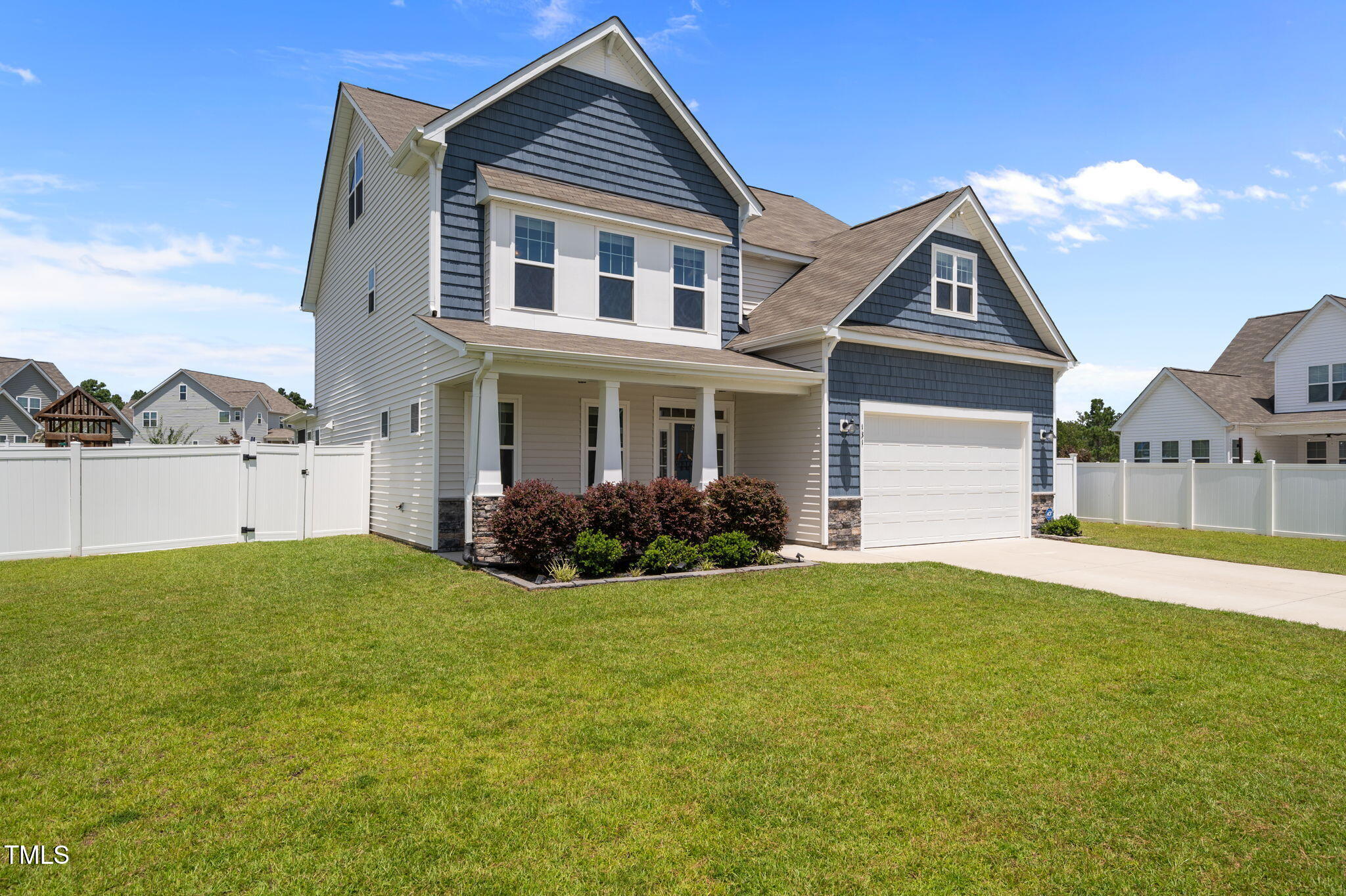 131 Sandy Springs Road Aberdeen, NC 28315 - Photo 2 of 61 a front view of a house with a yard