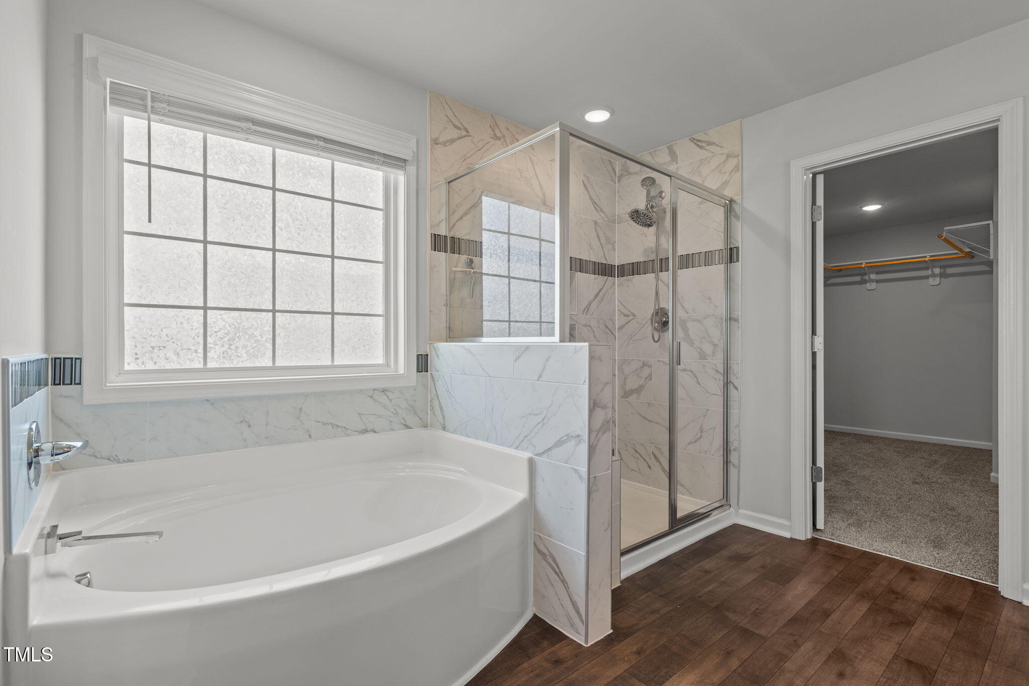 131 Sandy Springs Road Aberdeen, NC 28315 - Photo 38 of 61 a bathroom with a bathtub and a shower