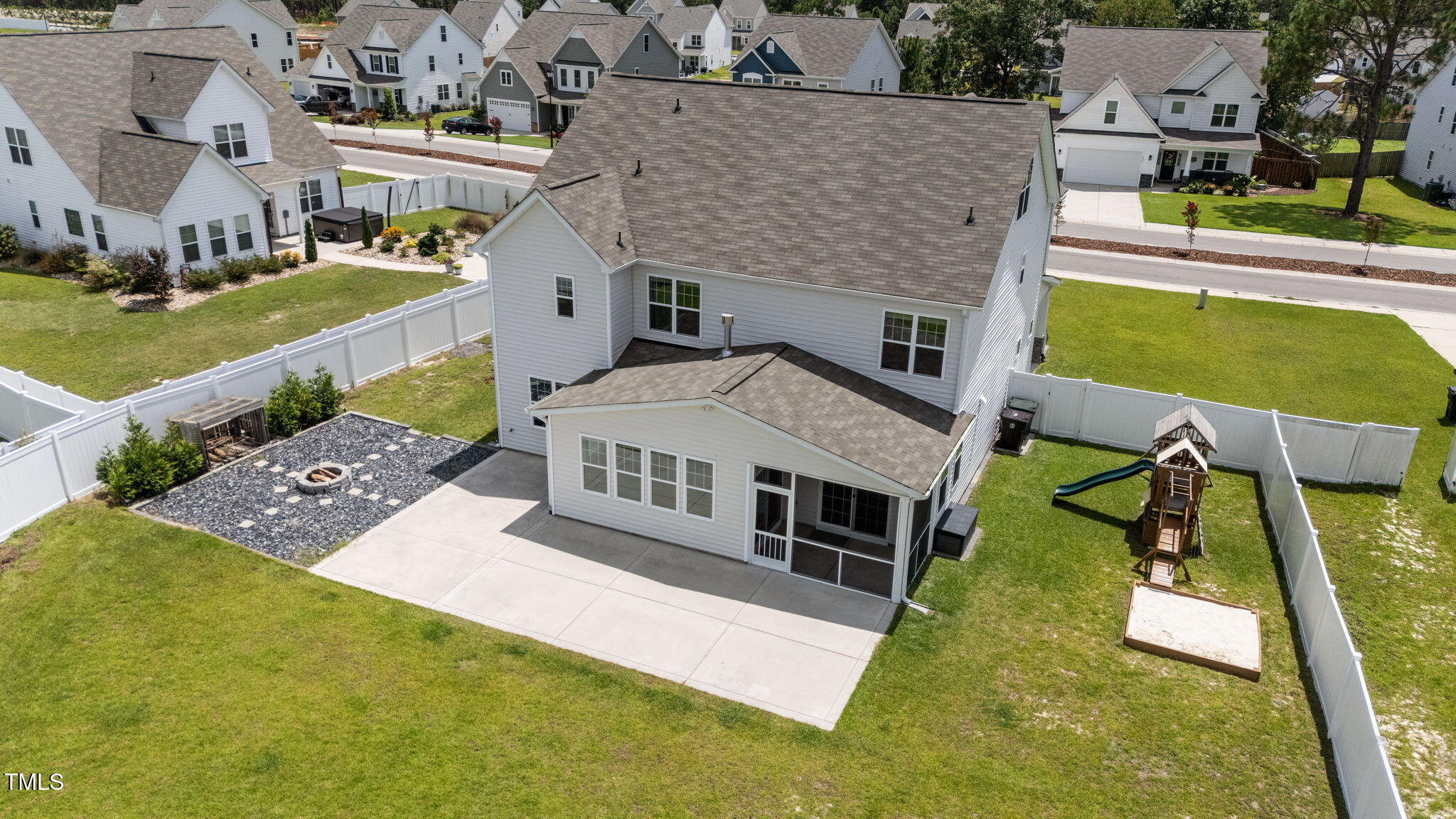 131 Sandy Springs Road Aberdeen, NC 28315 - Photo 56 of 61 a aerial view of a house with a yard
