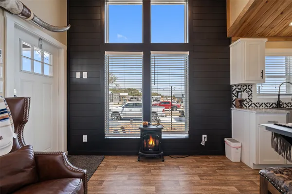 a living room with furniture and a window