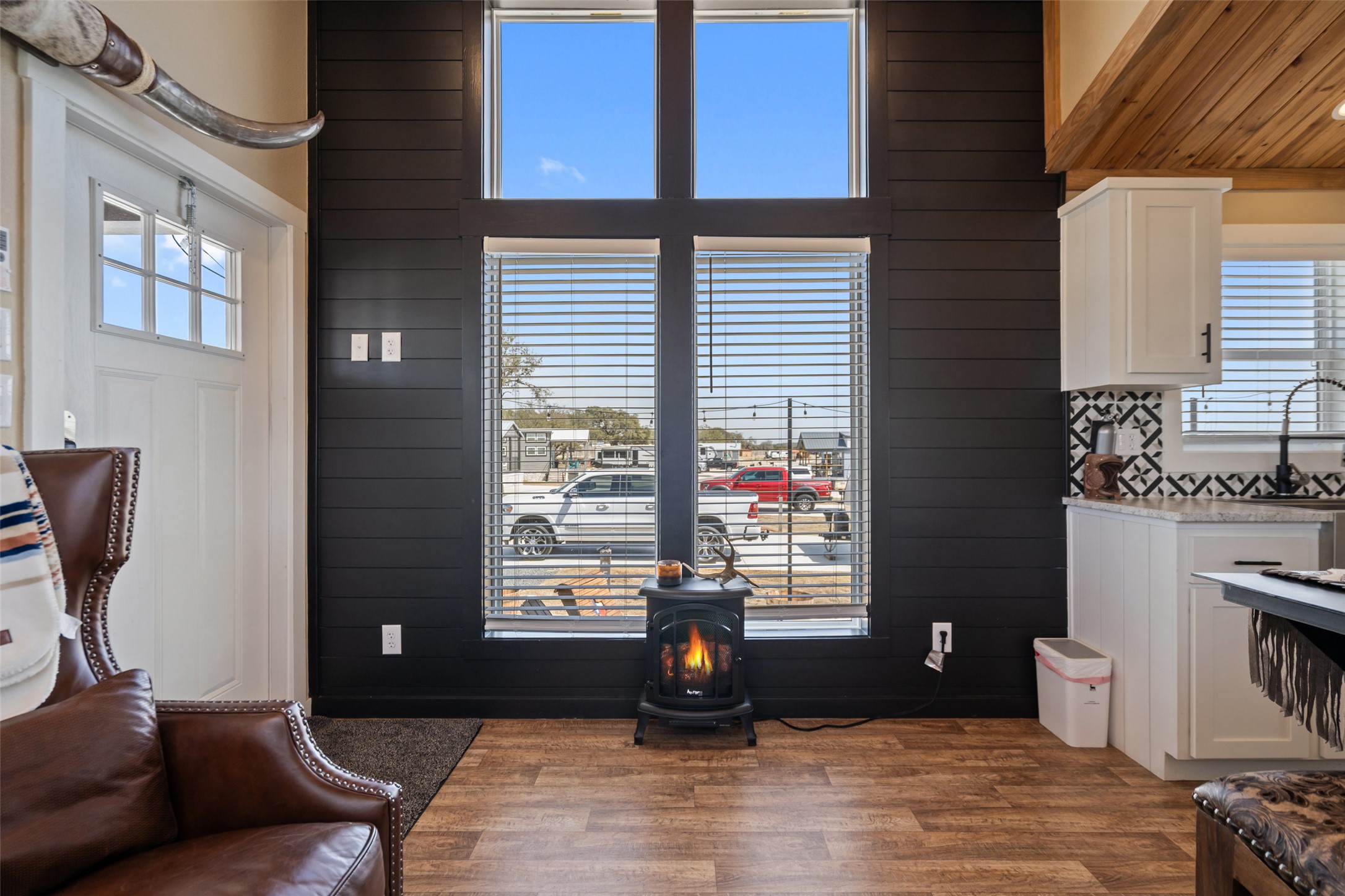 a living room with furniture and a window