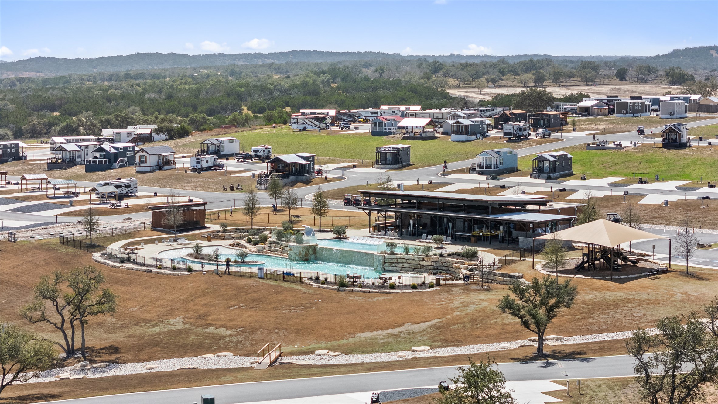 5386 Ranch Road 1376, Unit 50 Fredericksburg, TX 78624 - Photo 28 of 32 a view of a lake with a mountain