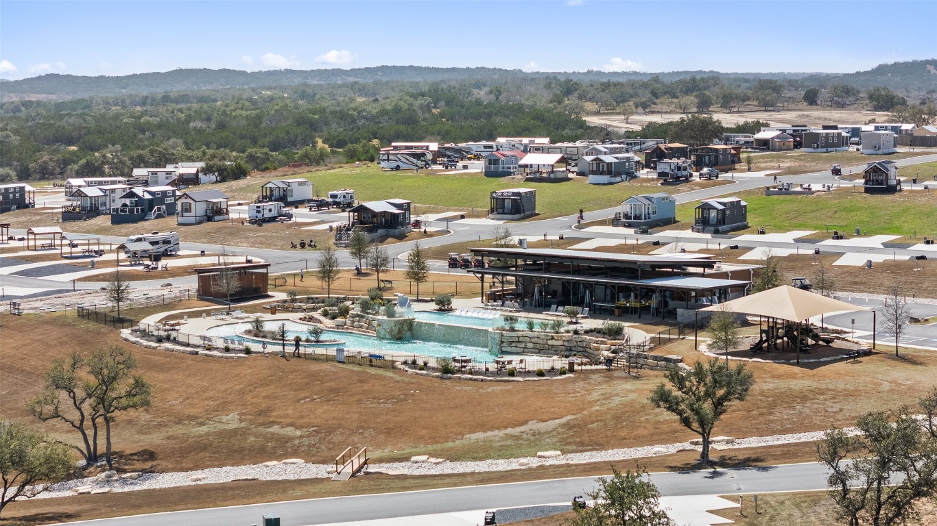 5386 Ranch Road 1376, Unit 50 Fredericksburg, TX 78624 - Photo 28 of 32 a view of a lake with a mountain