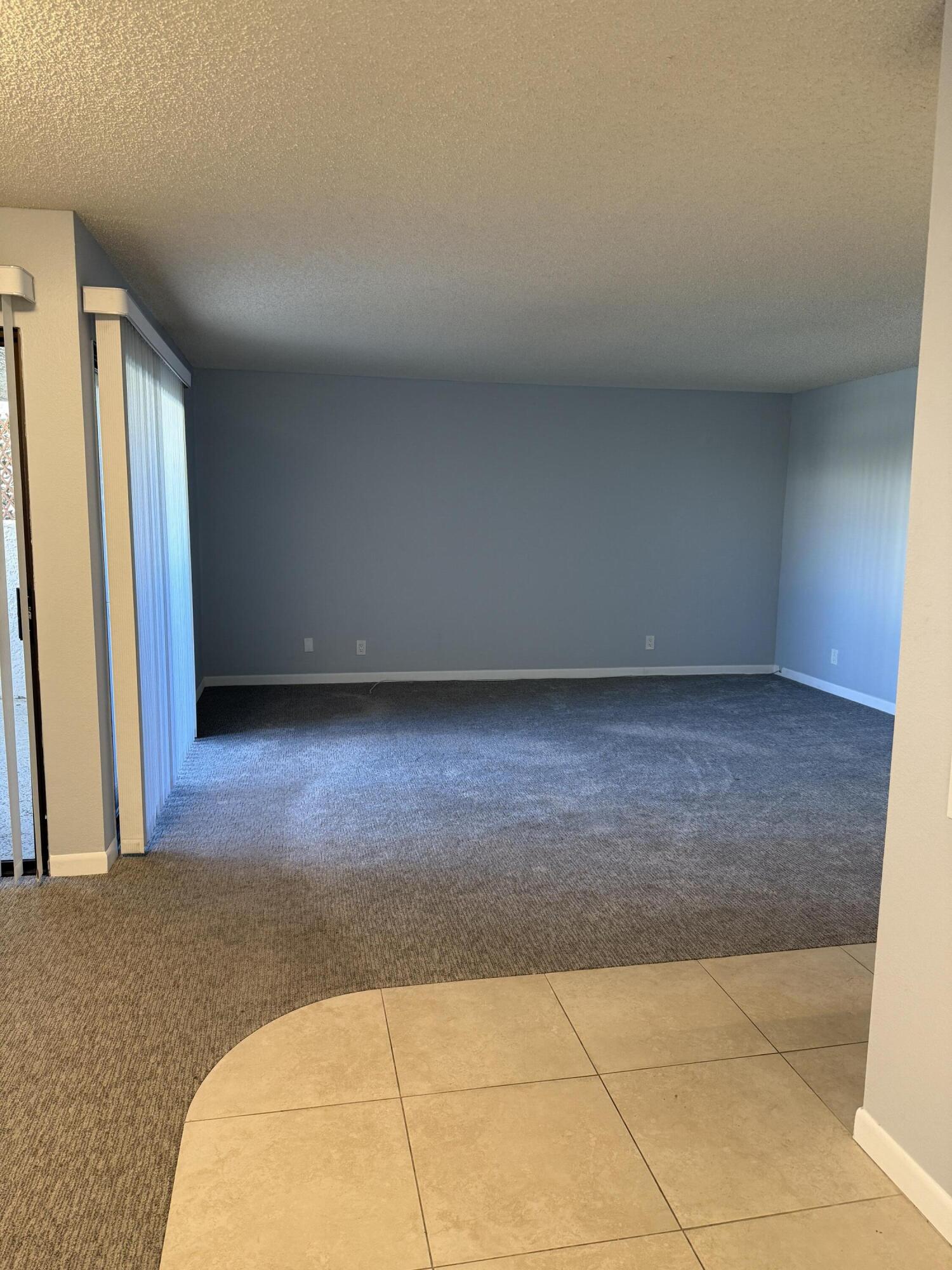 2017 Normandy Court Palm Springs, CA 92264 - Photo 8 of 17 en empty room with windows