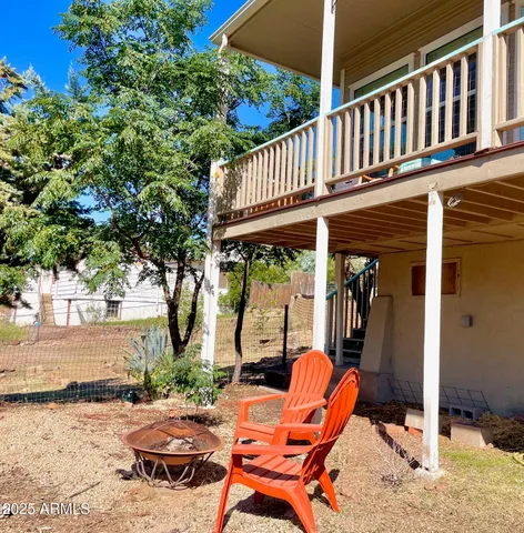 a view of a yard with swimming pool