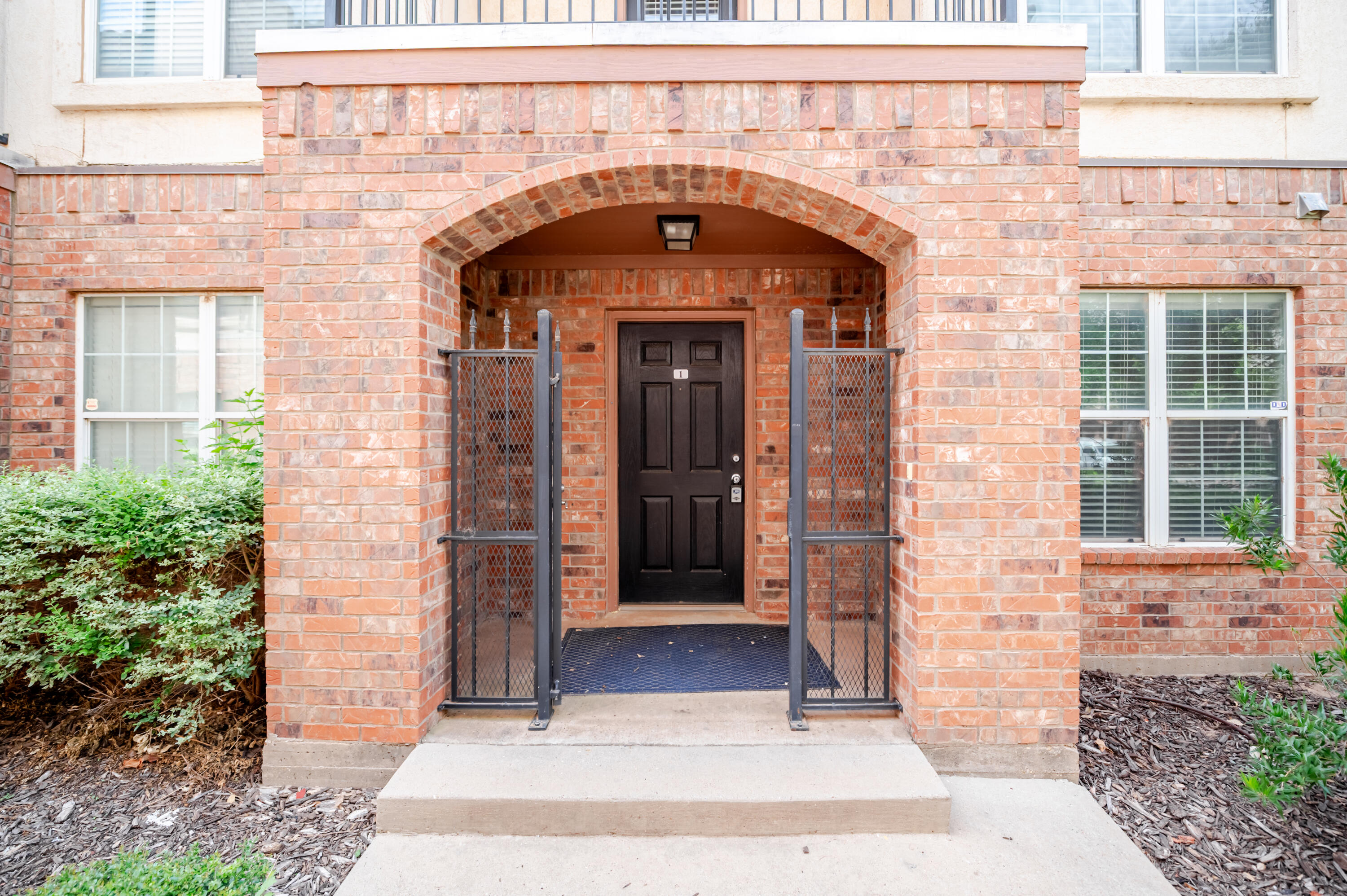 2111 Main Street, Unit 1 Lubbock, TX 79401 - Photo 1 of 36 a front view of a building with a entrance