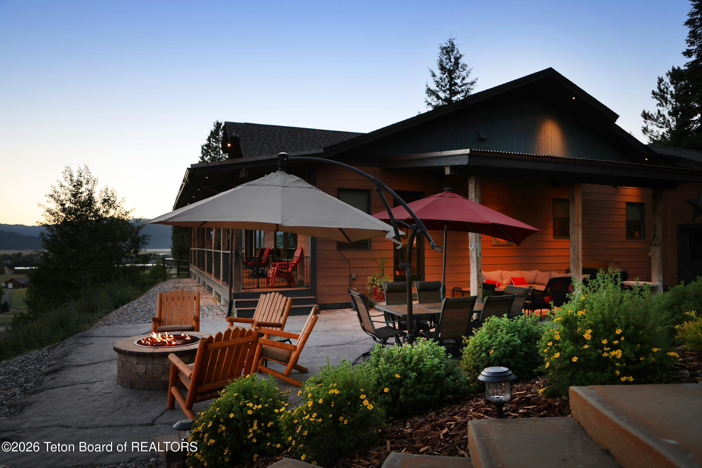 166 Aspen Ridge Trail Alpine, WY 83128 - Photo 40 of 50 39_166_Aspen_Ridge_Trail_BackPatioWestEx