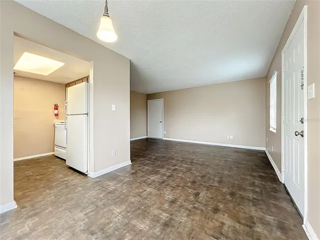 an empty room with a natural light