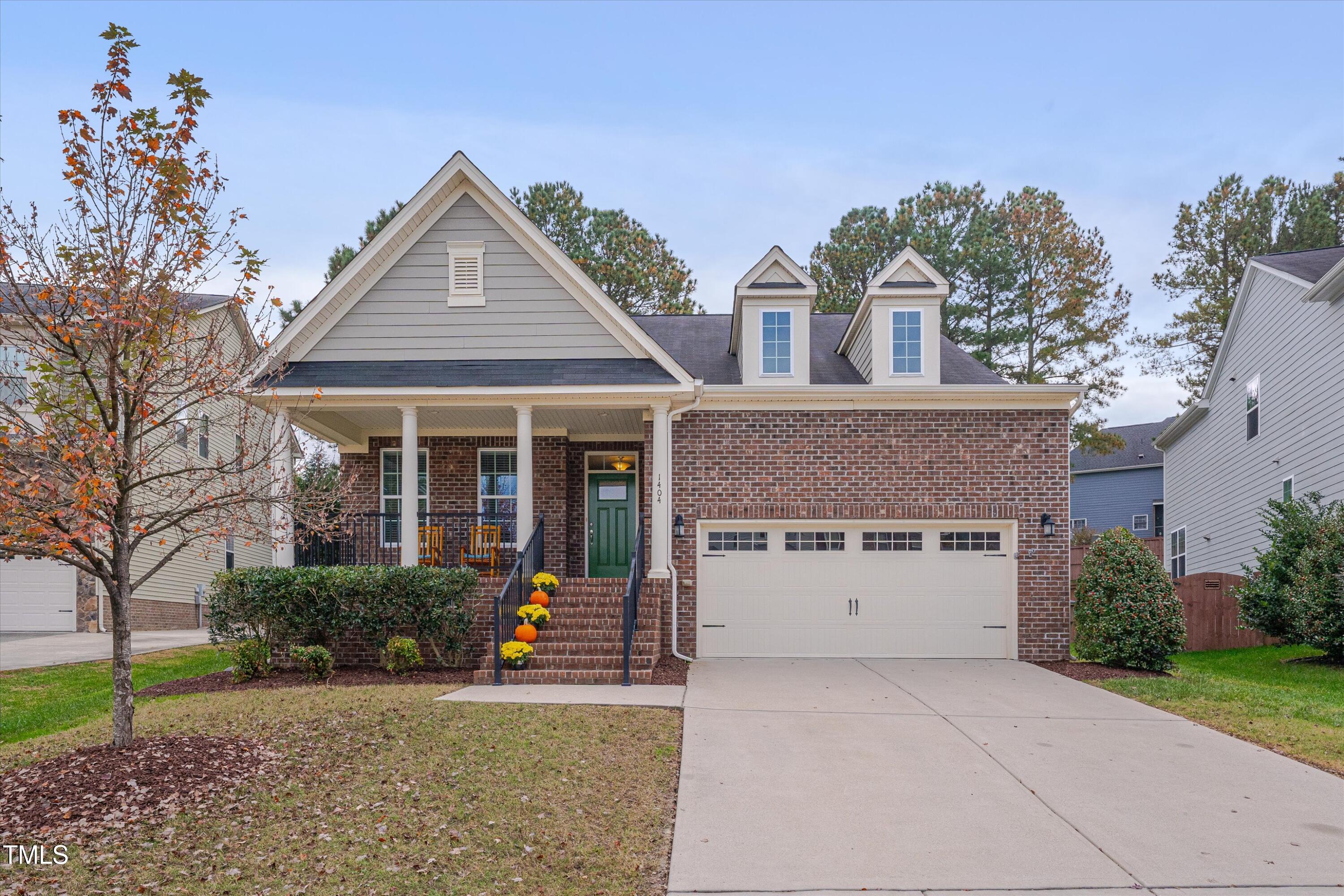 1404 Litchborough Way Wake Forest, NC 27587 - Photo 1 of 37 front view of a house with a yard