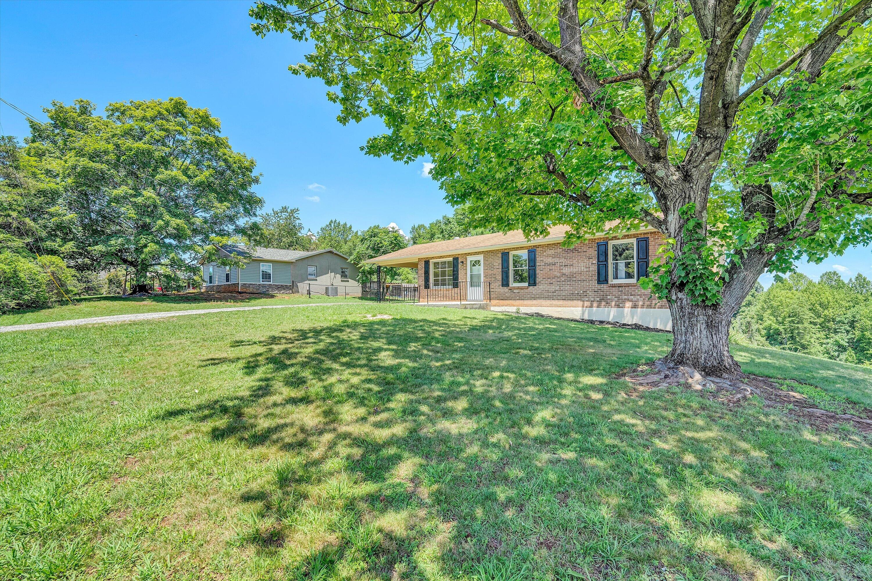 602 Power Dam Road Rocky Mount, VA 24151 - Photo 28 of 34 a house view with a garden space