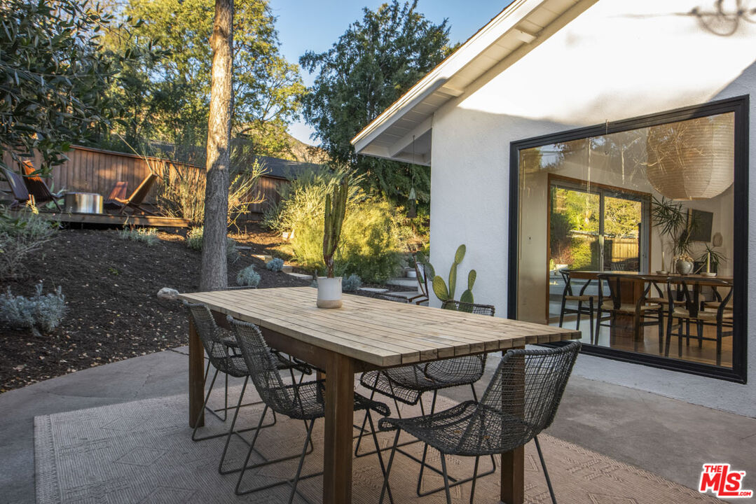 530 Pleasant Avenue Ojai, CA 93023 - Photo 24 of 29 a view of an outdoor space with furniture and white umbrellas