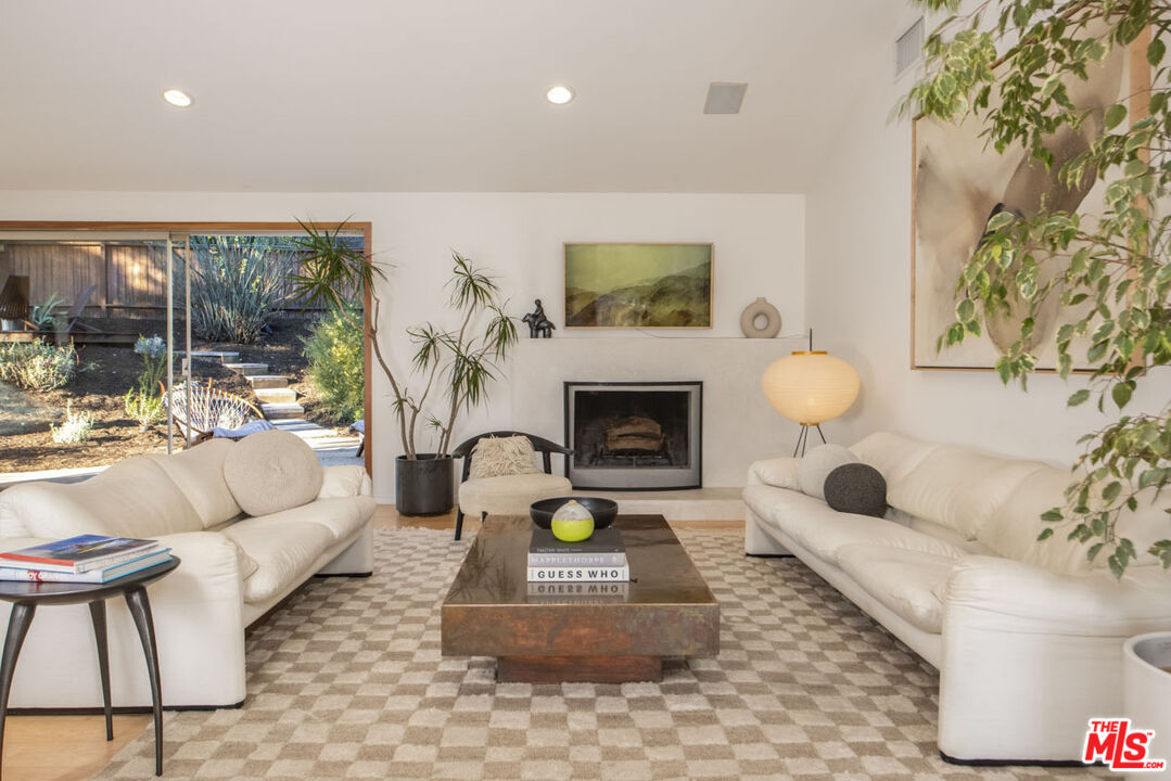 530 Pleasant Avenue Ojai, CA 93023 - Photo 7 of 29 a living room with furniture and a fireplace