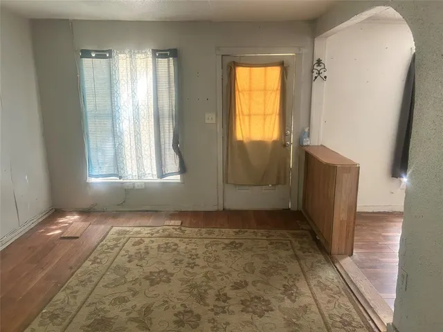 an empty room with windows