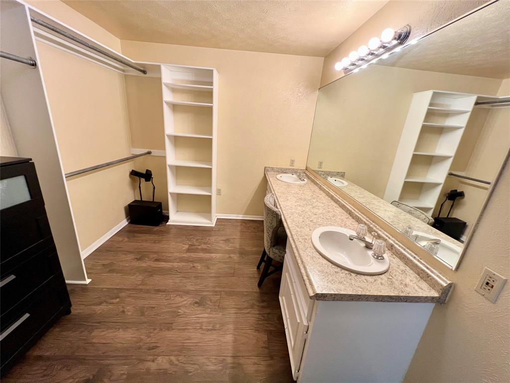2805 Scott Mill Road Carrollton, TX 75007 - Photo 12 of 19 a storage room with washer and dryer