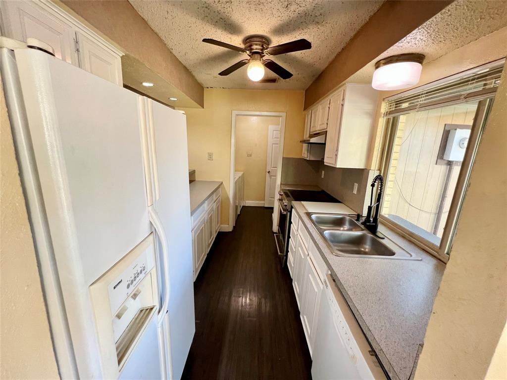 2805 Scott Mill Road Carrollton, TX 75007 - Photo 3 of 19 a view of living room with furniture and a flat screen tv