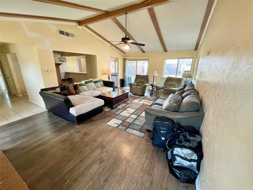 2805 Scott Mill Road Carrollton, TX 75007 - Photo 7 of 19 a living room with furniture and wooden floor