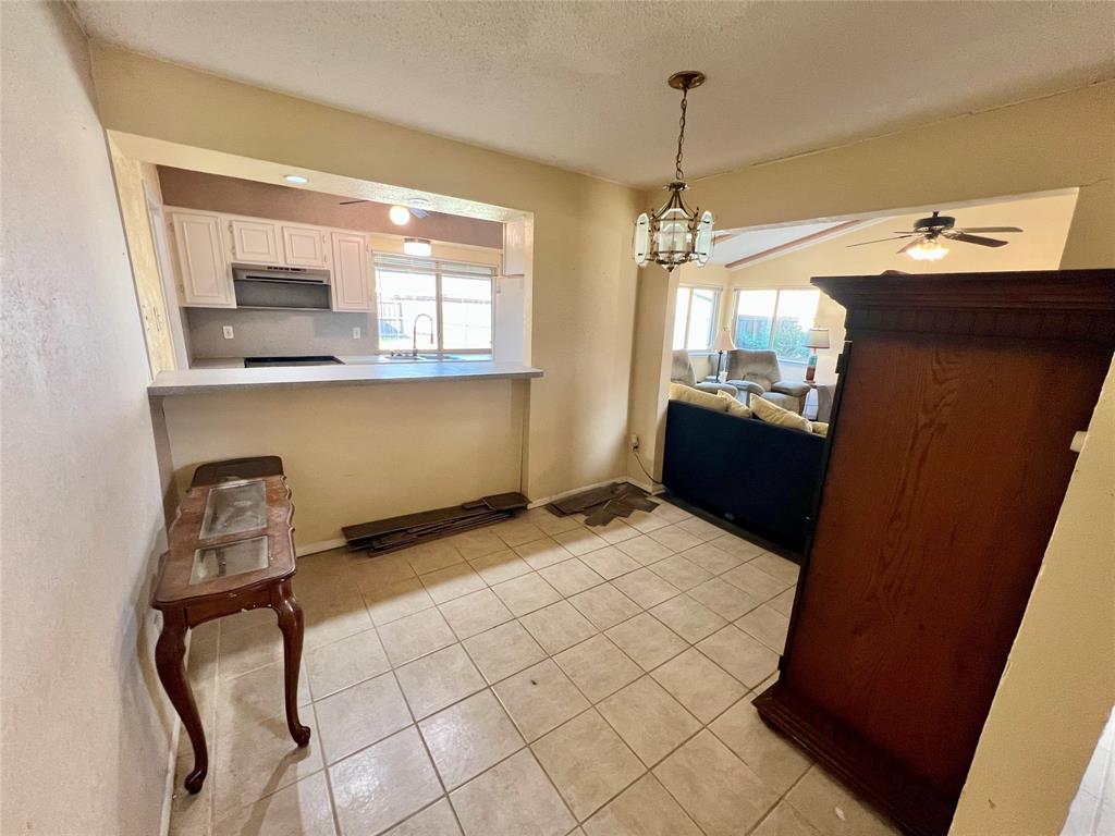 2805 Scott Mill Road Carrollton, TX 75007 - Photo 8 of 19 a bedroom with a bed and a window