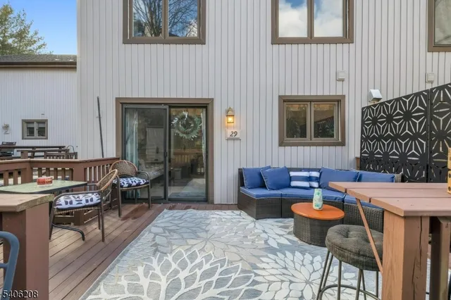 a living room with furniture and a table