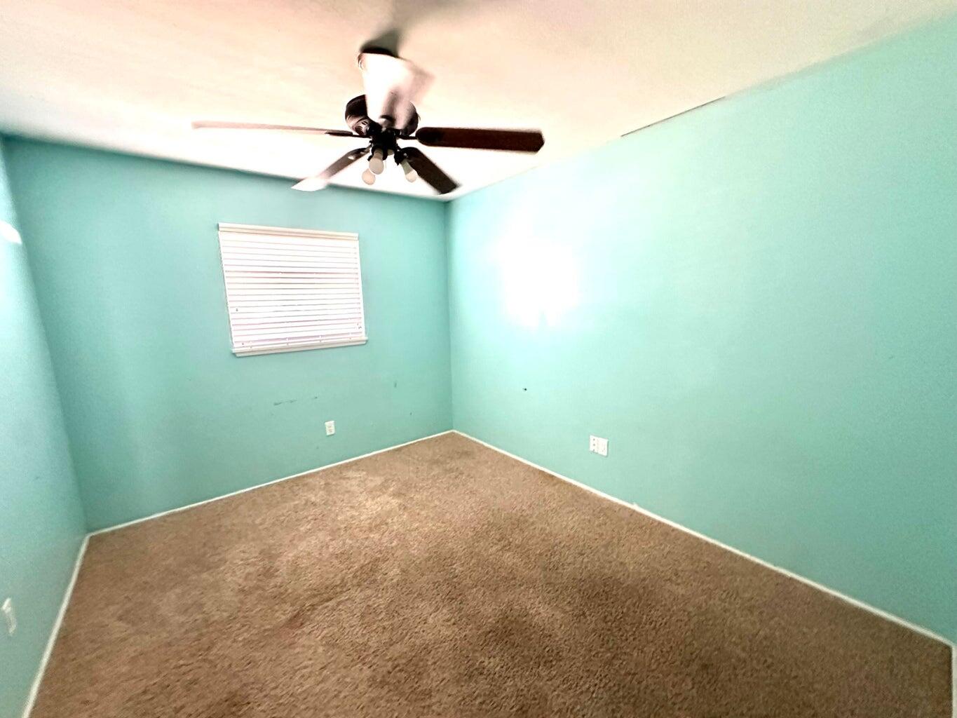 2615 West 19th Plainview, TX 79072 - Photo 11 of 15 a view of a big room with carpet