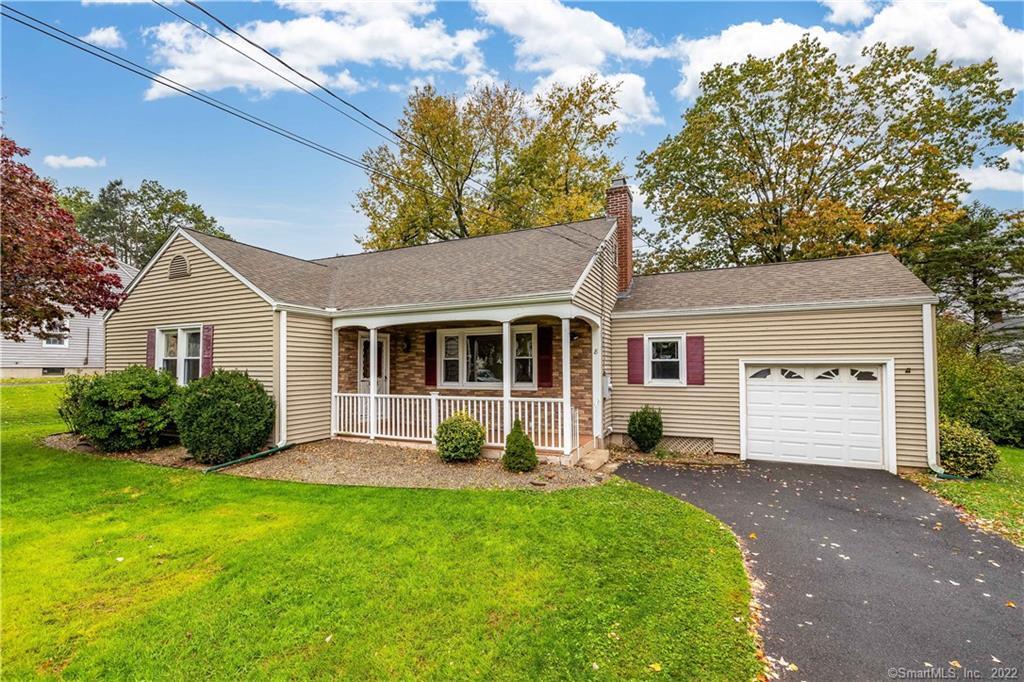8 Carleton Road West Hartford, CT 06107 - Photo 1 of 1 a view of a house with a backyard and a tree