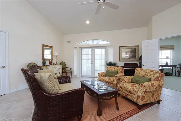 a living room with furniture and a window