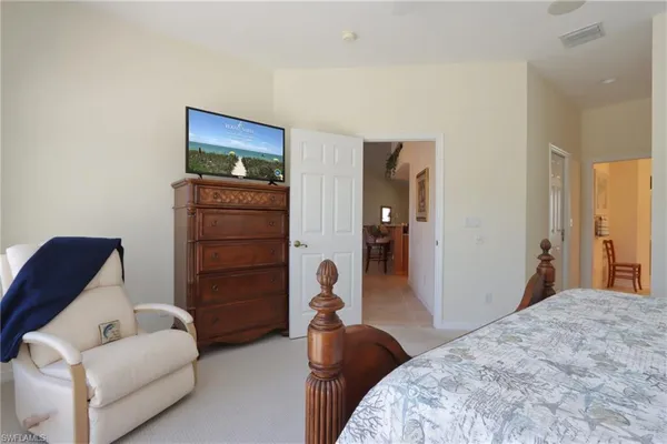 a bedroom with a bed and furniture