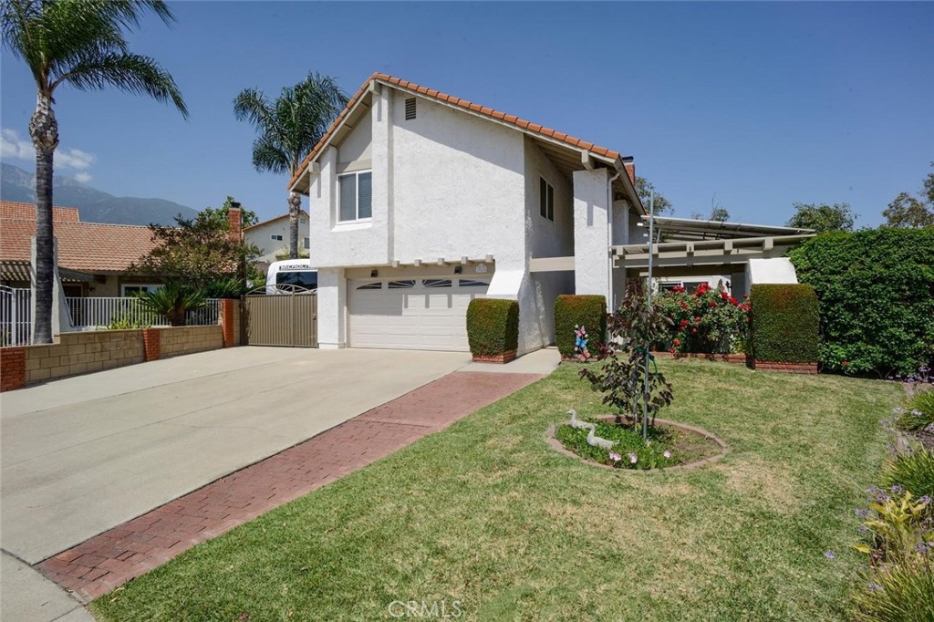 10424 Cartilla Court Rancho Cucamonga, CA 91737 - Photo 36 of 36 a view of a house with backyard and sitting area