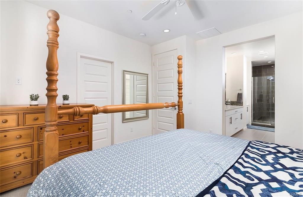 88 Agave Lake Forest, CA 92630 - Photo 16 of 26 a bedroom with a bed and a dresser