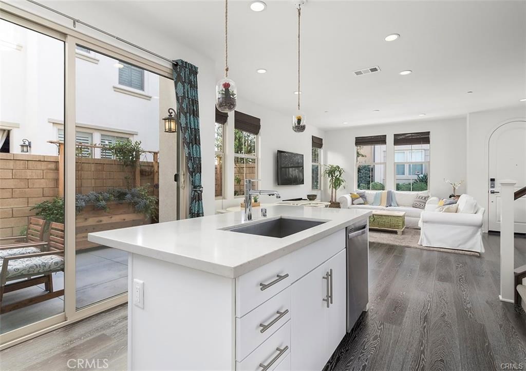 88 Agave Lake Forest, CA 92630 - Photo 6 of 26 a kitchen with a sink and a large window