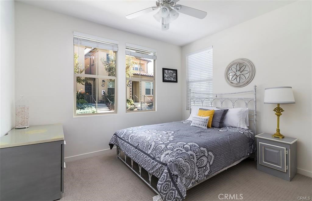 88 Agave Lake Forest, CA 92630 - Photo 8 of 26 a bedroom with a bed and a window