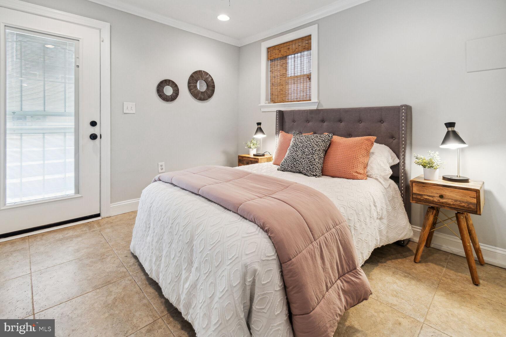 45 R Street Northwest, Unit 1 Washington, DC 20001 - Photo 18 of 21 Second bedroom with exit to parking.