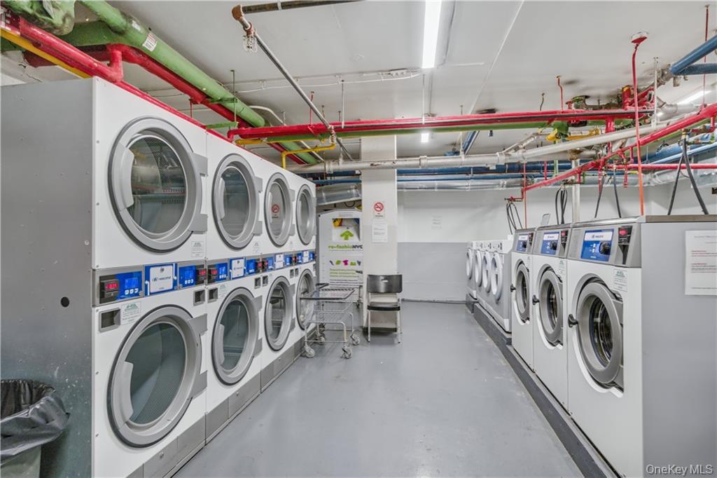 35-11 85th Street, Unit 3H Queens, NY 11372 - Photo 22 of 27 a utility room with dryer and washer