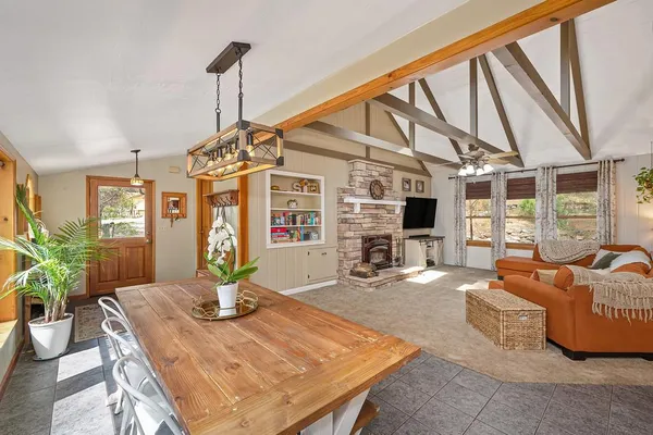 a kitchen with stainless steel appliances a refrigerator sink and cabinets