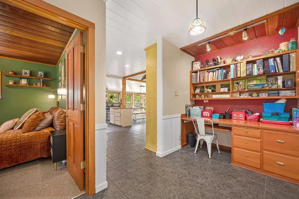 a room with furniture and a window