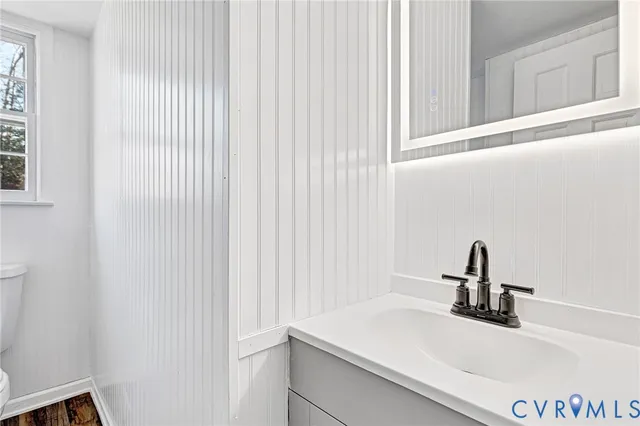 a view of kitchen with wooden floor