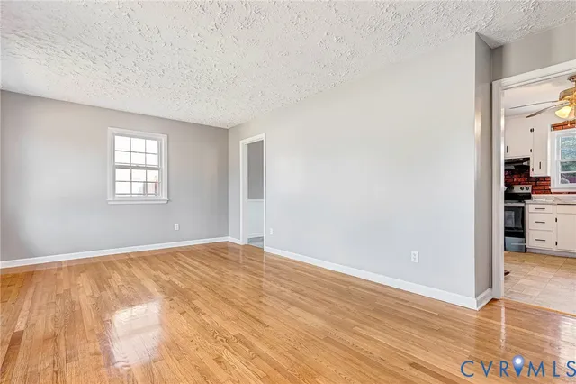 a view of an empty room and window