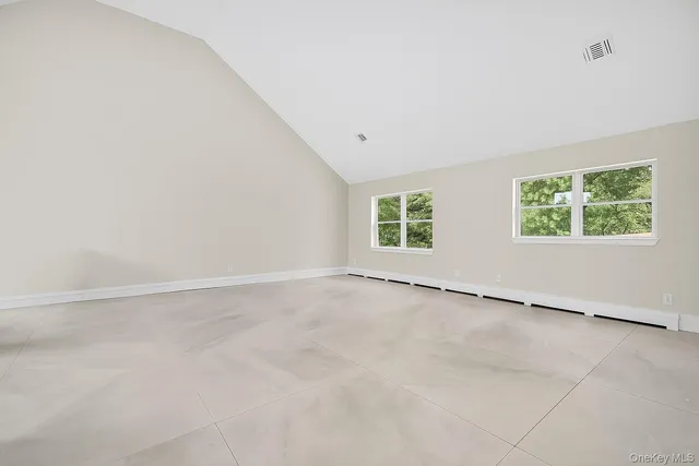 an empty room with windows