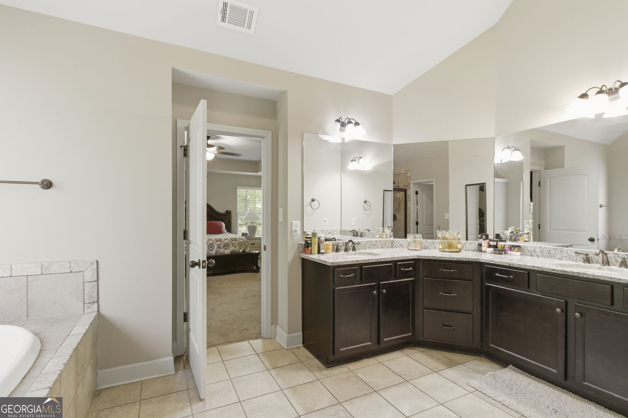 127 Austin Storey Circle Newnan, GA 30263 - Photo 21 of 34 a kitchen with a sink and cabinets