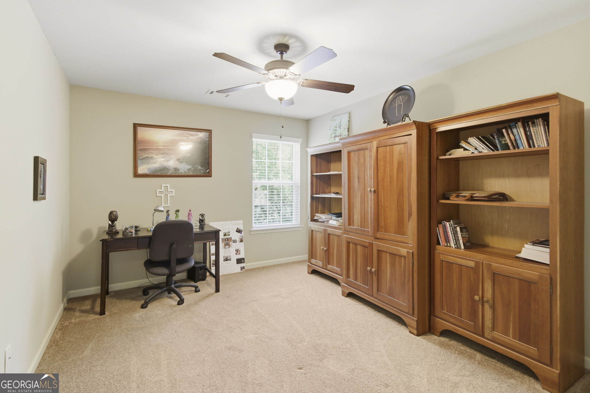 127 Austin Storey Circle Newnan, GA 30263 - Photo 25 of 34 a view of a workspace with furniture and a window